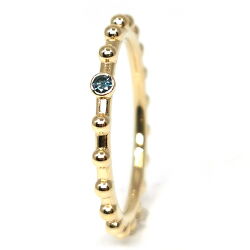 Gelbgoldring mit blauem Diamant