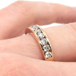 Memoirring aus Rotgold mit Kanalfassung und Diamanten