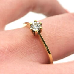 Goldring mit Diamant und 6er Krappenfassung