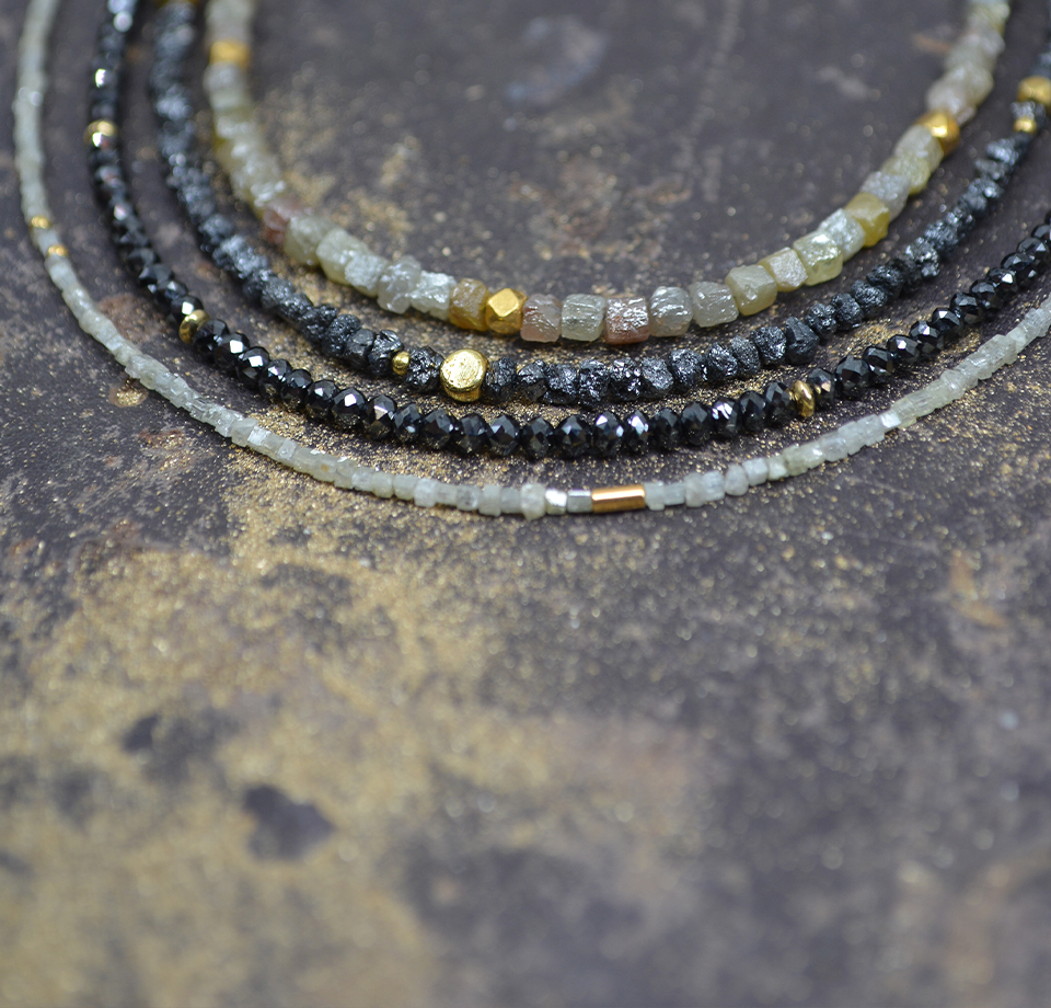 Schwarze und beige Diamantketten mit Gelbgold Goldschmiede Albath